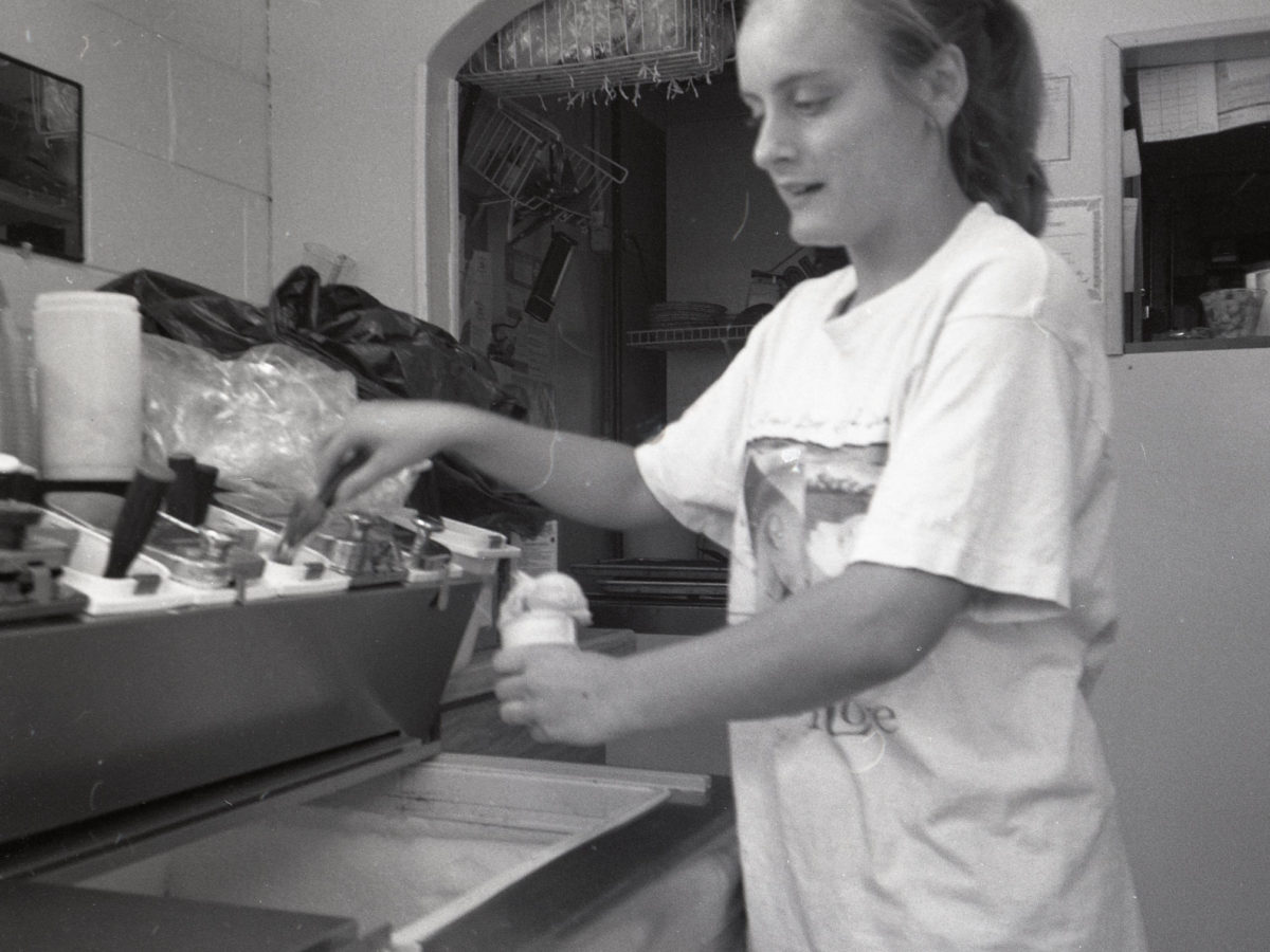 An Ollie's crew member scooping frozen custard in 1994